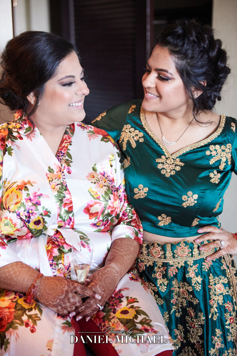 Indian bride and sister before wedding ceremony